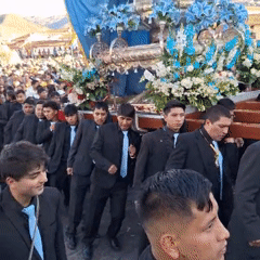 Religious procession with Virgin Mary float observed in Cuzco