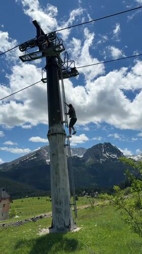 Person climbs ski lift tower, performs acrobatics in Montenegro