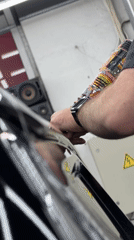 Automotive repair work observed on black car in Krasnoyarsk