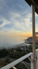 Sunset and observation tower documented in coastal Nebug, Russia