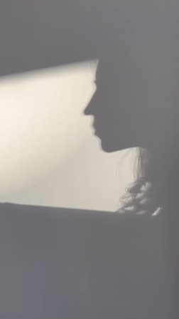 Person's profile shadow captured on wall in Podgorica