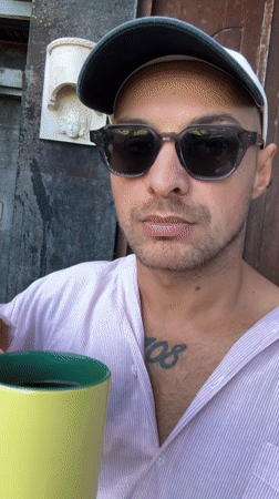 Slow Bali morning: coffee, selfies, a dog, and palm trees