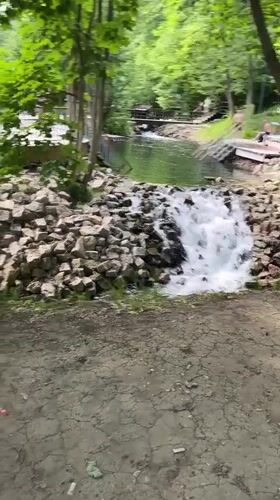 Wooded waterfall spot with walkways in Kazan