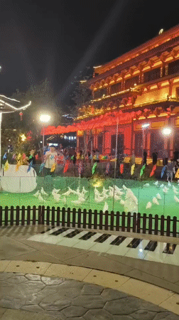 Evening stroll through Hunchun's Haiyu Ancient Town tourist district