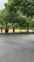 Cyclists practice cone maneuvers in Montenegro under overcast skies