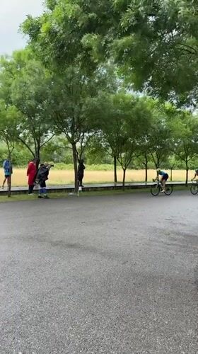 Cyclists practice cone maneuvers in Montenegro under overcast skies