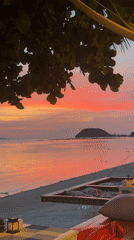 Sunset beach scene documented in Baan Thong Po, Thailand