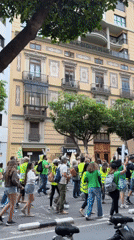 Protesters in green, yellow march through Valencia streets