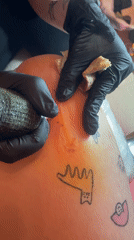 Late-night tattoo session documented in Belgrade's Vracar district