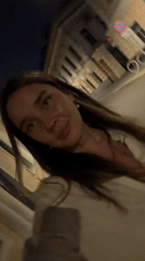 Woman records nighttime selfie videos on Moscow streets