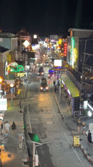 Elevated views capture street life and dining in Thai town