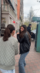 Young women socialize in downtown Yerevan Friday afternoon