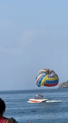 Colorful parasail ride over the Montenegrin Riviera coast