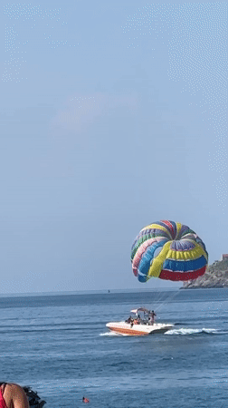Colorful parasail ride over the Montenegrin Riviera coast