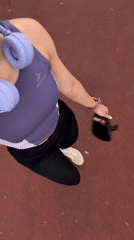 Woman exercises, films selfies on running track in Russia