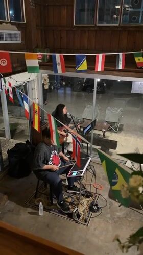 Night vibes at a Chiang Mai café with live music and drinks