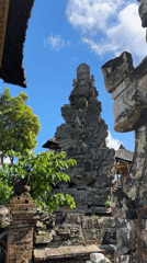 Ancient carved stone shrine documented in Ubud, Indonesia