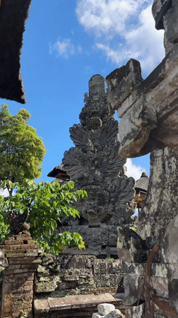 Ancient carved stone shrine documented in Ubud, Indonesia