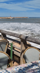 Coastal scenes captured along Dénia waterfront during sunny afternoon