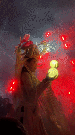 DJ and costumed performer entertain crowd in Kuta Selatan venue