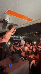 Energetic concert performance captured by audience in Buenos Aires