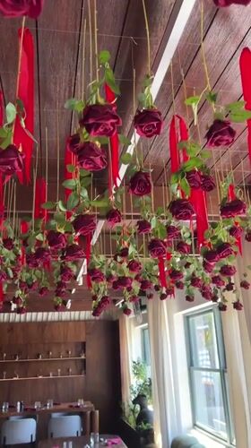 Rose-decorated dining experience with dessert service in Ubud