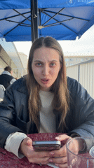 Woman enjoys morning cafe time in Kazan
