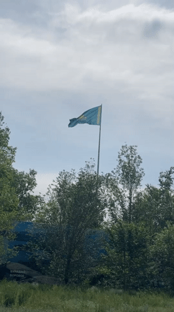 Kazakhstani flag flies in windy conditions in Astana
