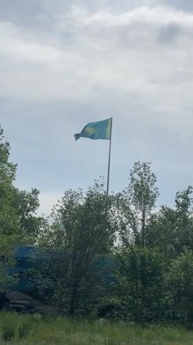 Kazakhstani flag flies in windy conditions in Astana