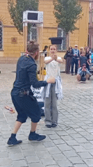 Street performers entertain on Wrocław's cobblestone plaza