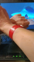 Late-night #WristCheck post featuring a red bracelet in Kommunarka