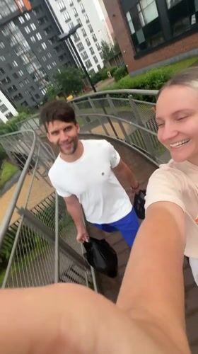 Selfie moment on a metal walkway in Saint Petersburg