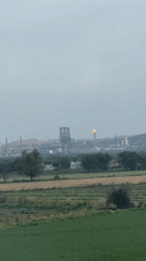 Industrial complex observed from agricultural fields in El Llano
