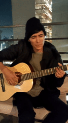 Late-night acoustic guitar session in Providencia, Santiago