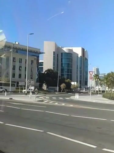 Vehicle journey through Dubai streets captured in daytime footage