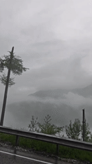 Foggy mountain roadside scene captured in Estosadok, Russia