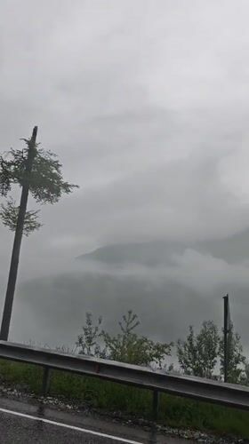 Foggy mountain roadside scene captured in Estosadok, Russia