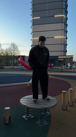 Families enjoy afternoon playground activities in Yuzhny, Russia