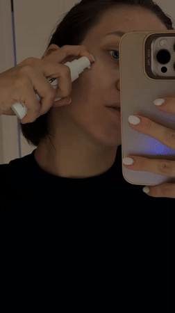Woman documents morning skincare routine in Pervomaysky, Russia