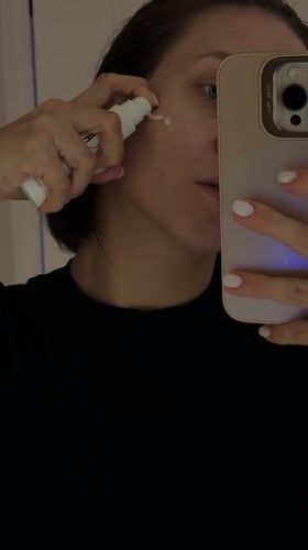 Woman documents morning skincare routine in Pervomaysky, Russia