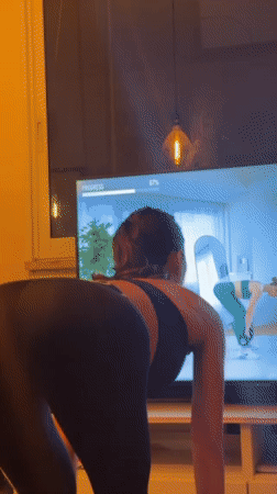 Woman conducts home workout session in Tel Aviv