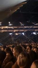 Live band performs to packed arena crowd in London