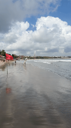 Beach, surf shops, and coconuts in Kuta, Bali