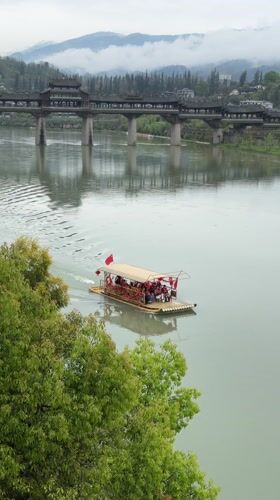 Traditional Chinese covered bridge and river scenes captured in Zhuoshui