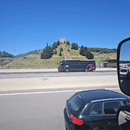 Highway traffic observed near Le Perthus including bus and truck