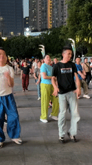 Group performs synchronized dance in Liangjiang public square