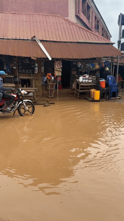 Ihiagwa residents navigate flooded streets during daily activities