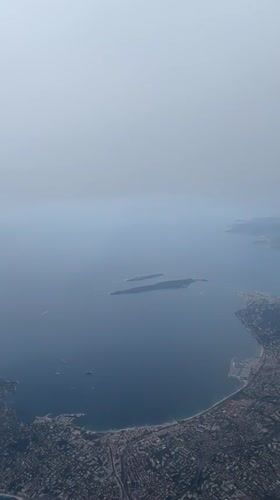 Overcast skies obscure aerial view of Antibes coastline