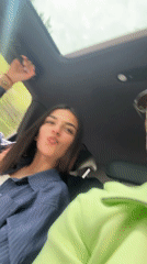 Travelers take playful car selfies in Byala, Bulgaria
