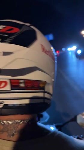Motorcyclist spotted wearing anime-branded helmet in Kamala, Thailand